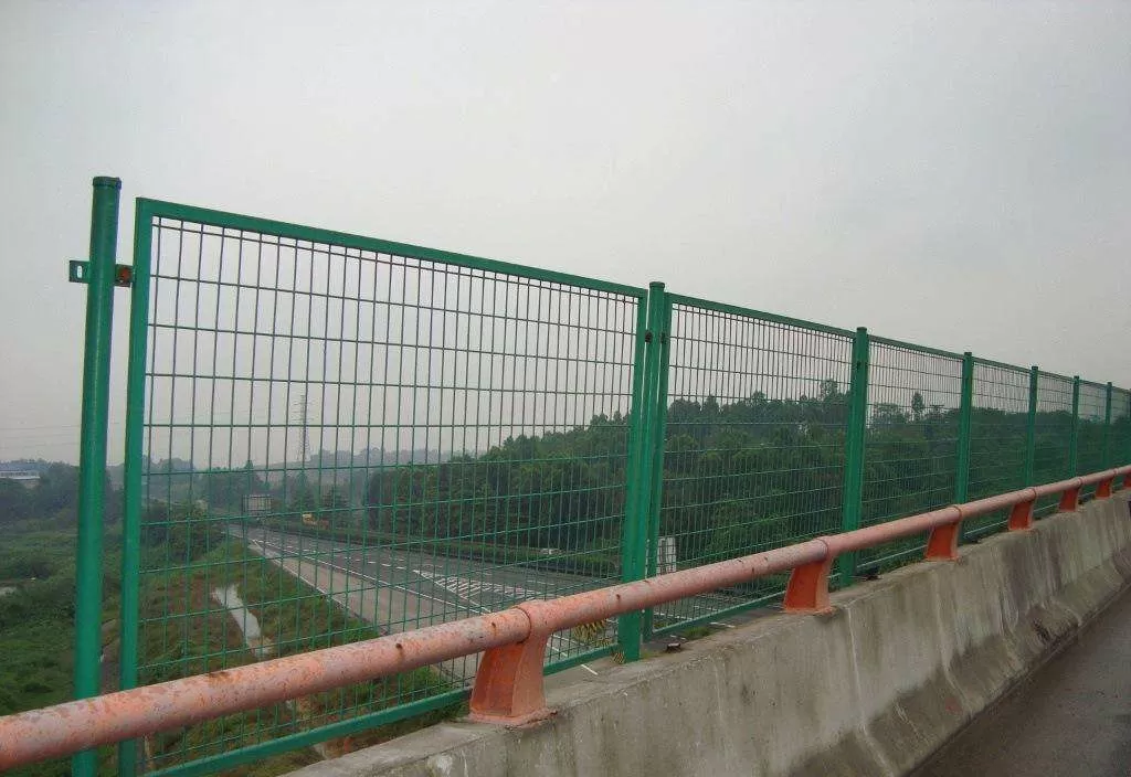 Framed welded mesh fence panel with a rectangular tube frame