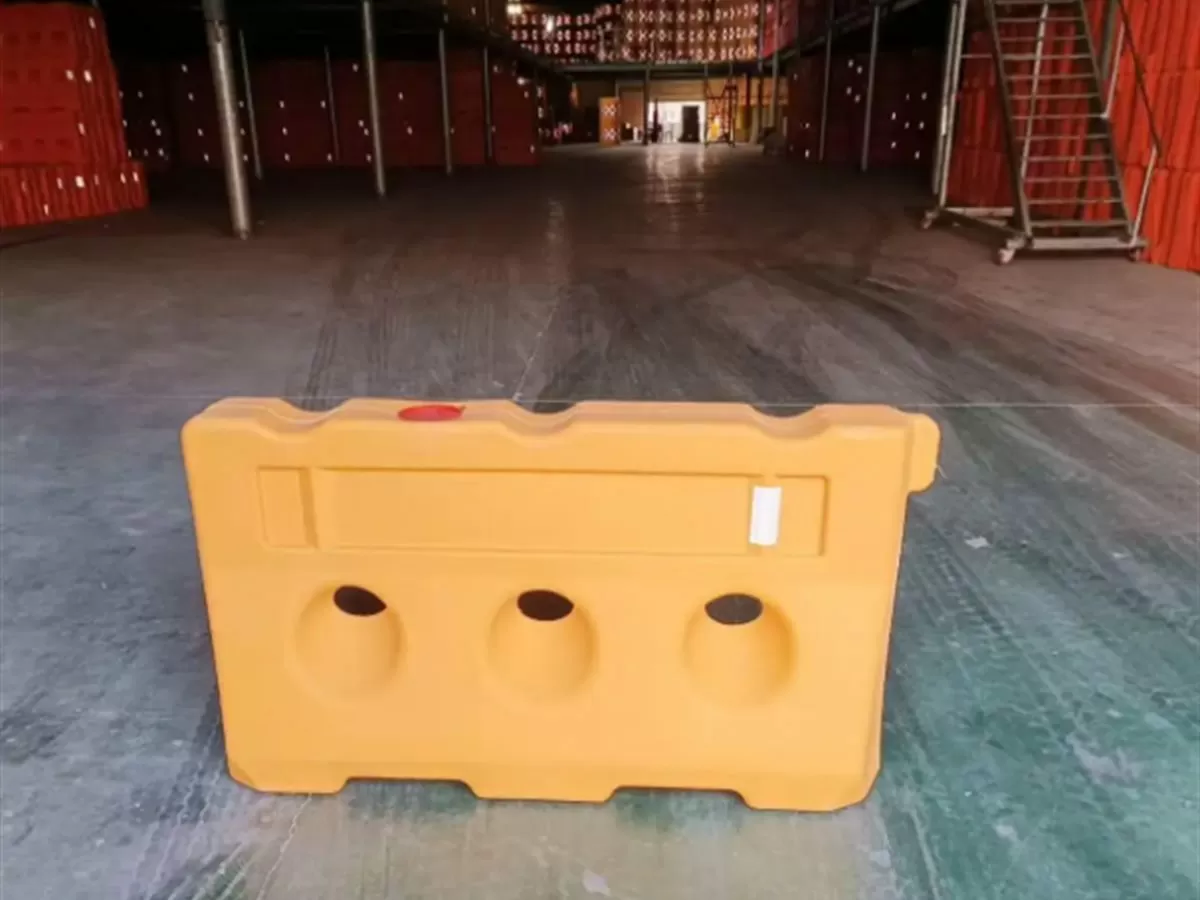 Two water-filled barriers connected end to end to form a continuous run
